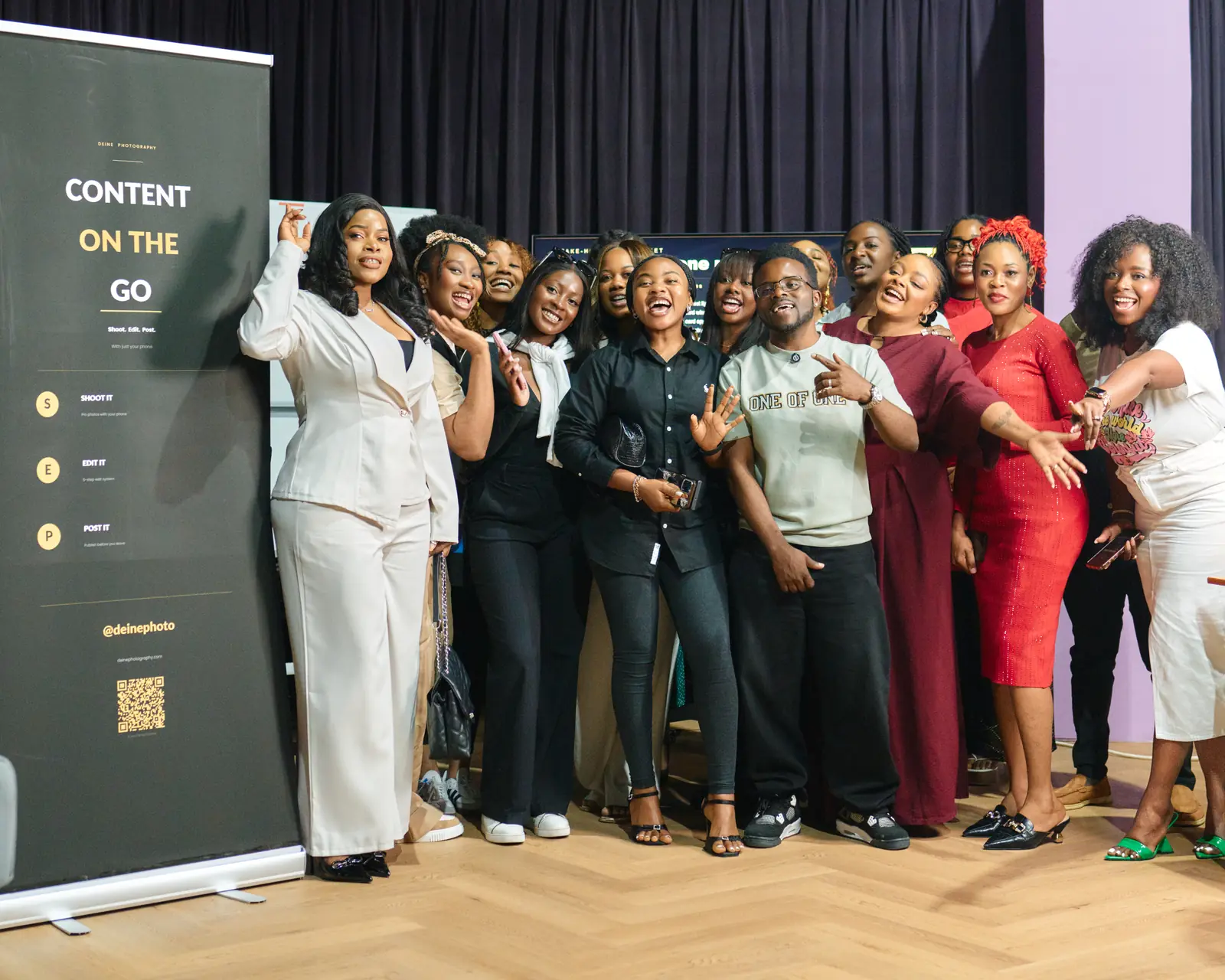 Eric Deine standing with participants after a practical creator workshop in Dubai.
